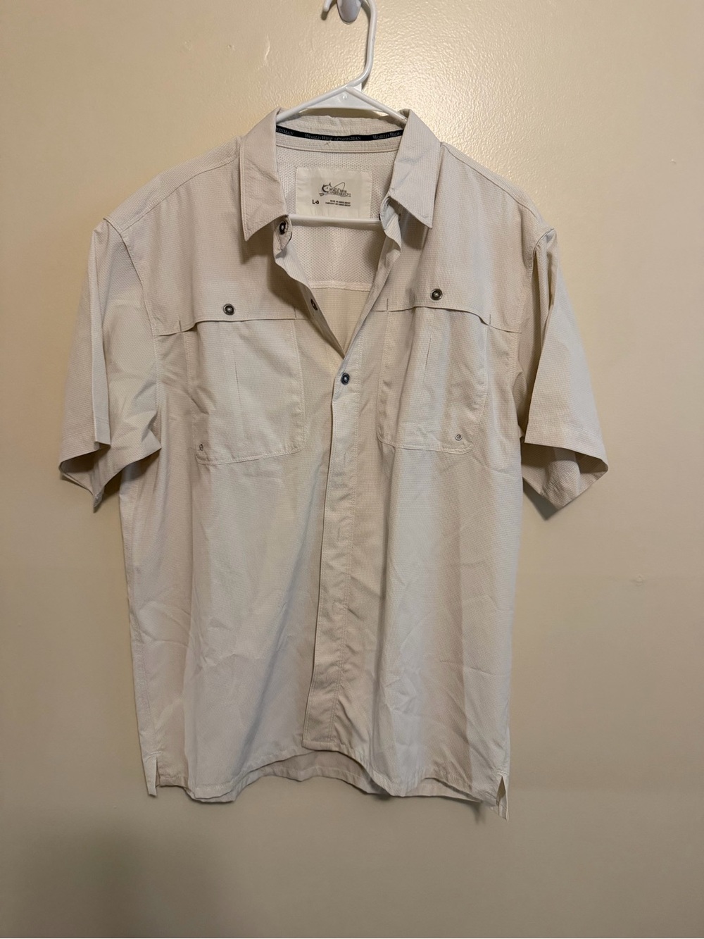 Worldwide Sportsmen’s Short Sleeve Button-DownPerformance Shirt in off white